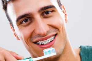 Guide To Flossing And Maintaining Oral Hygiene With Braces